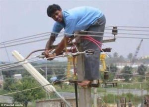 Man on a pilon - Health and Safety Risk